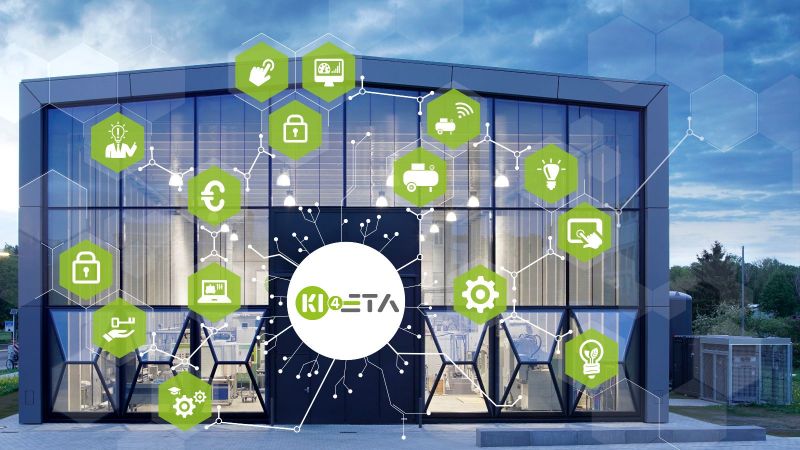 Die ETA-Fabrik der TU Darmstadt ist hinter einer Grafik zum Thema künstliche Intelligenz zu sehen.