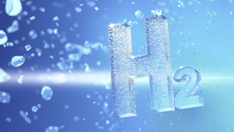 Der Schriftzug H2 vor einem Hintergrund mit Wassertropfen