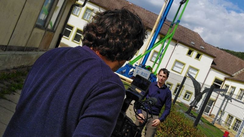 A cameraman films one of the protagonists of the film 