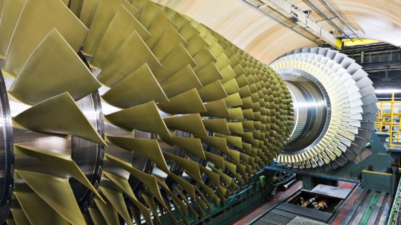 The photo shows a gas turbine in a high-speed balancing plant.