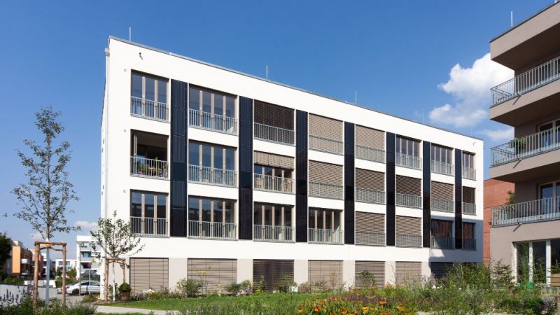 Example of a solar-active, grid-connected energy supply for a new housing estate