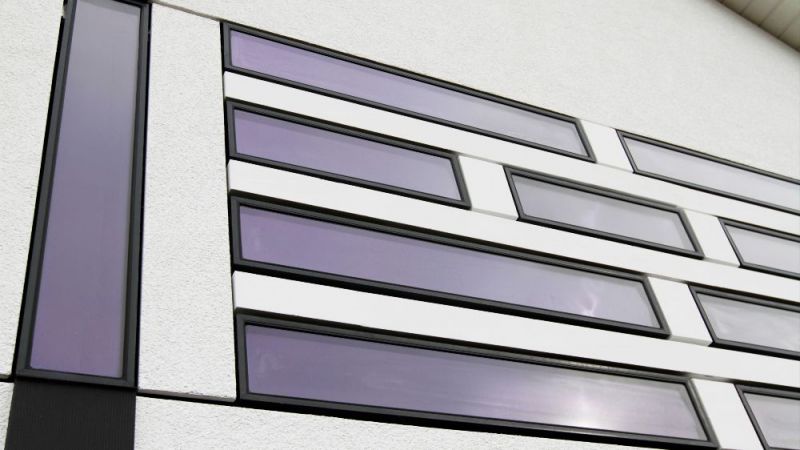 Vertically and horizontally oriented strip collectors on the demonstration facade.