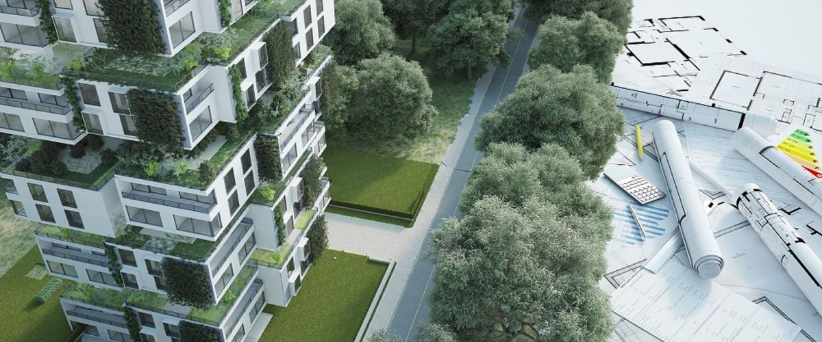 Symbolbild Gebäude mit grünen Pflanzen