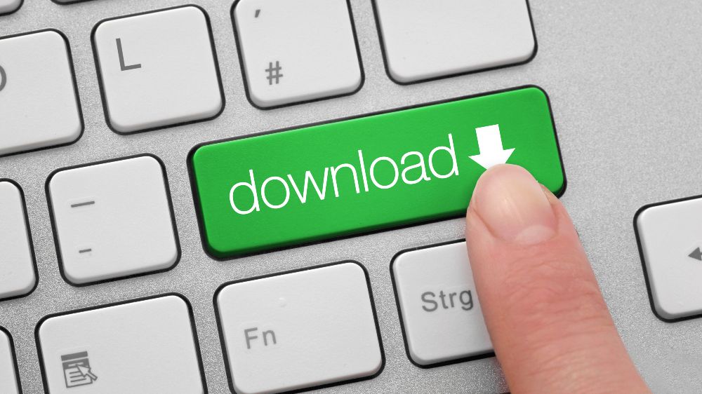 Symbolbild Downloadbereich: Finger auf Download-Taste