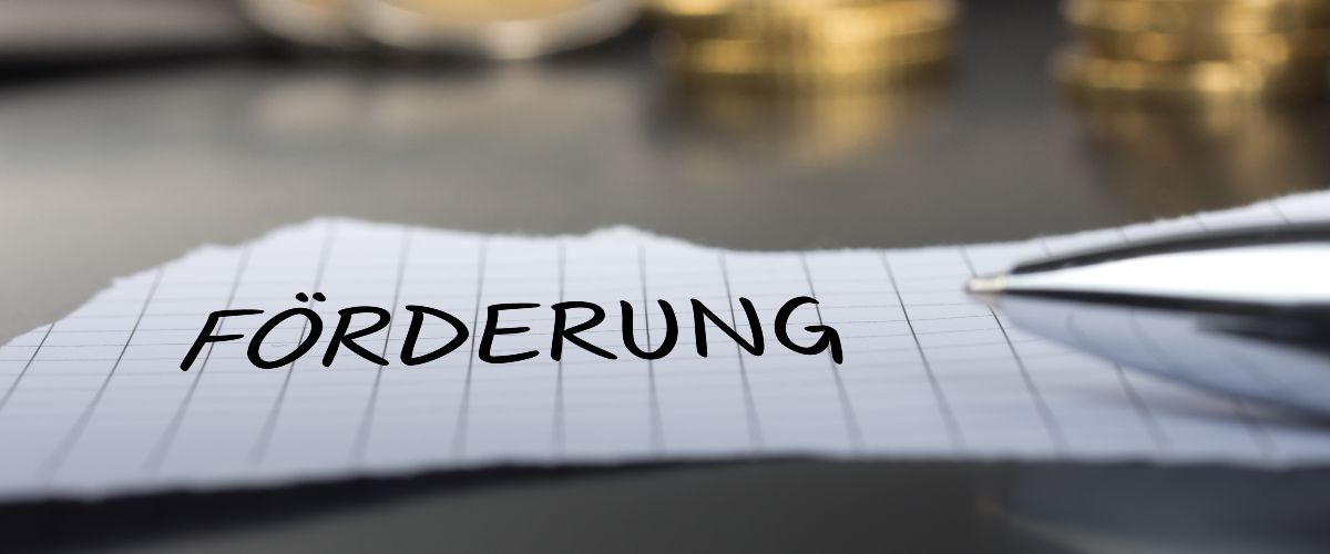 Zettel mit dem Aufdruck Förderung
