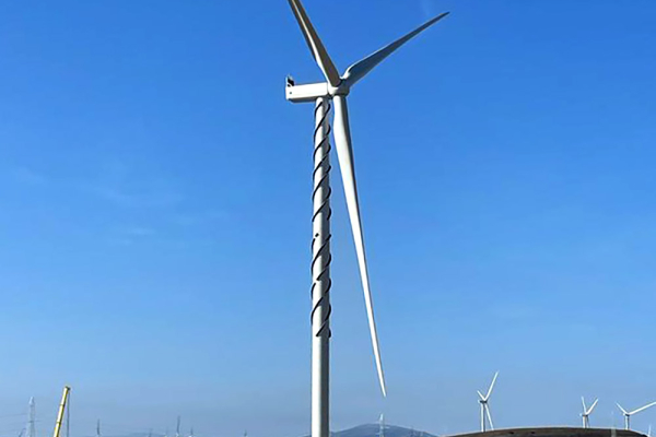 Wind turbine under construction, the Scruton coils are attached to the tower.